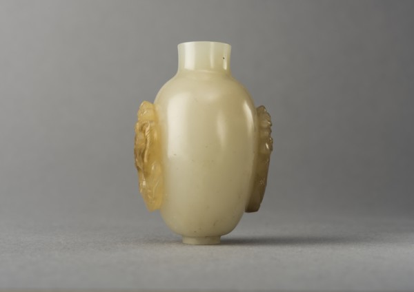 Jade snuff bottle with raised carving of animals, China, Qing dynasty, 1644-1911. Creator: Unknown.