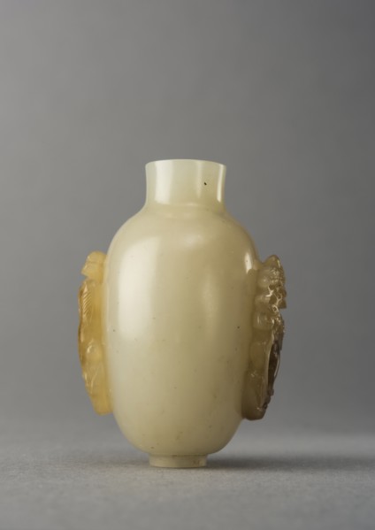 Jade snuff bottle with raised carving of animals, China, Qing dynasty, 1644-1911. Creator: Unknown.