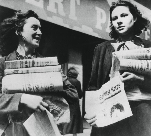Women selling German newspapers, German-occupied Paris, 19 July 1940. Artist: Unknown