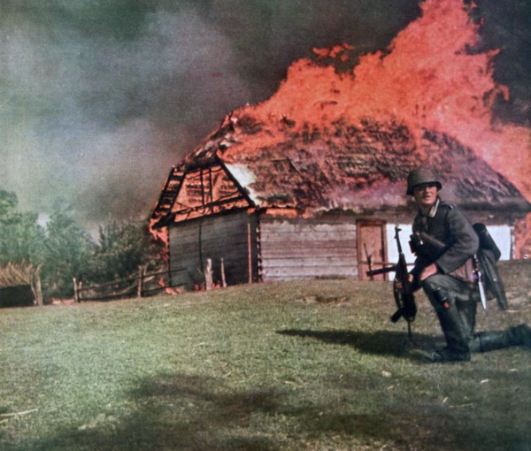 'Through the curtain of flame German observers move forward', Russia, 1941. Artist: Unknown