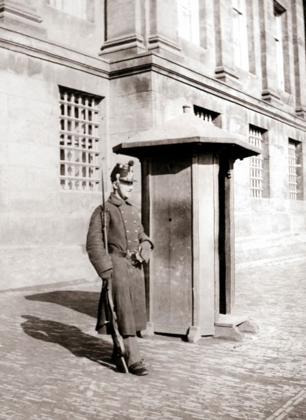Guard, Brussels, 1898.Artist: James Batkin