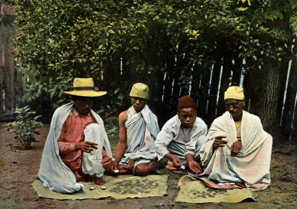 Hova money changers, Madagascar, late 19th century.Artist: Gillot