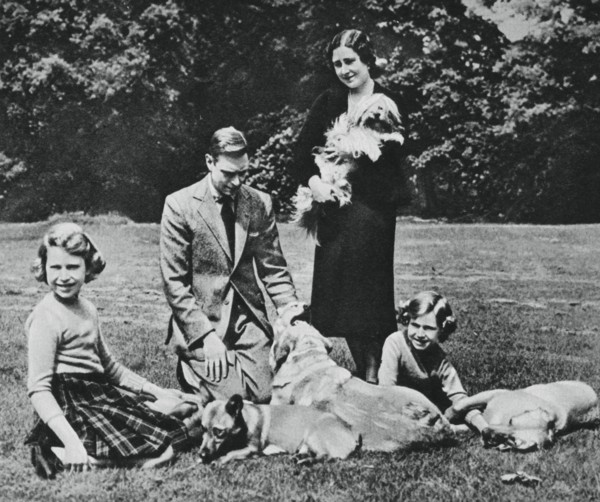 Royal family as a happy group of dog lovers, 1937. Creator: Michael Chance.