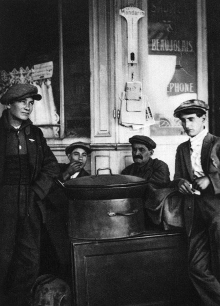 Street sellers of roasted chestnuts, Paris, 1931.Artist: Ernest Flammarion