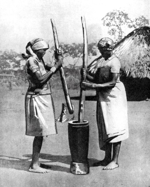 Two Mashona tribeswomen pounding maize and millet, Zimbabwe, Africa, 1936.Artist: Wide World Photos