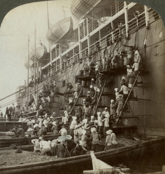 Coaling the Pacific mail SS 'Siberia', at the fortified naval station of Nagasaki, Japan, 1904. Artist: Underwood & Underwood