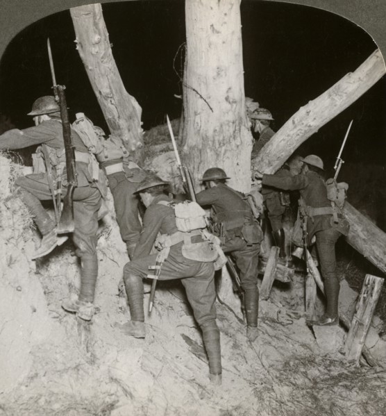 Soldiers leaving a trench for a night raid at Messines, Belgium, World War I, 1914-1918.Artist: Realistic Travels Publishers