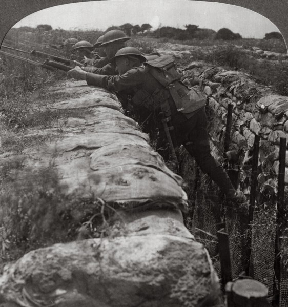 Canadians leaving their trenches to rush a German position, World War I, 1914-1918.Artist: Realistic Travels Publishers