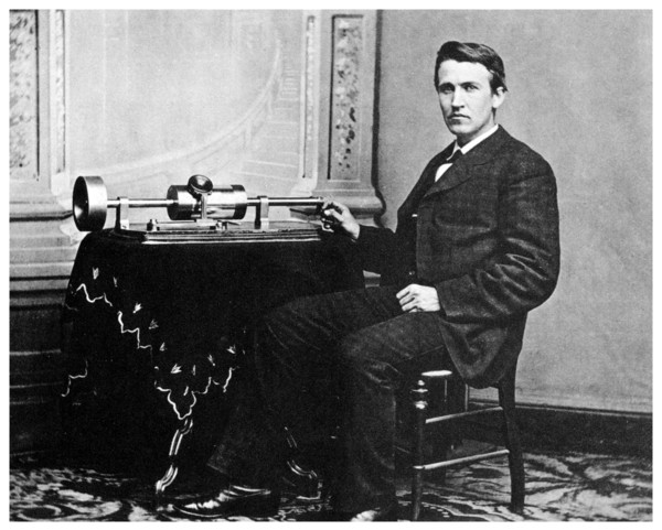 Thomas Alva Edison, American inventor, with his phonograph, c1878 (1955). Artist: Unknown