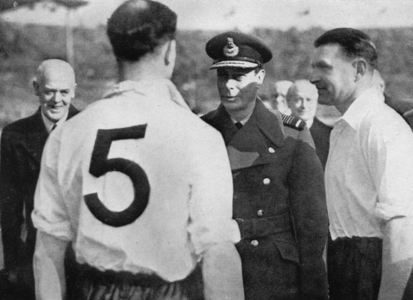 English footballer Eddie Hapgood meeting King George VI, c1937-c1944. Artist: Unknown