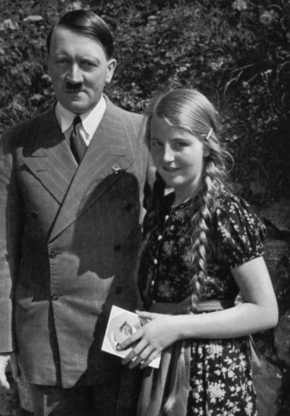 A young girl asks Adolf Hitler for his autograph, 1936. Artist: Unknown
