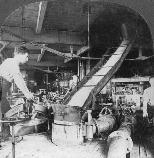 Sugar beet pulp and juice flowing from tank to tank, Montreal, Canada, early 20th century(?). Artist: Keystone View Company