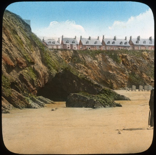 Beach and cliffs, Newquay, Cornwall, late 19th or early 20th century. Artist: Church Army Lantern Department