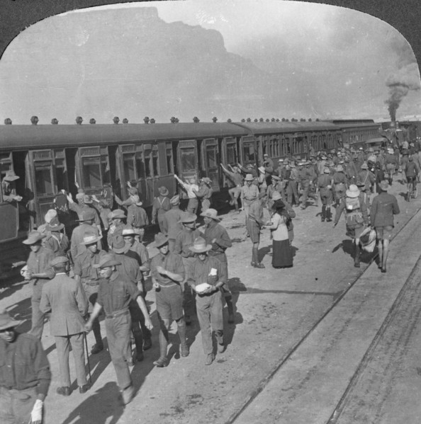 Soldiers of the Wiltshire Rifles boarding a train, Cape Town, South Africa, World War I, c1915. Artist: Realistic Travels Publishers