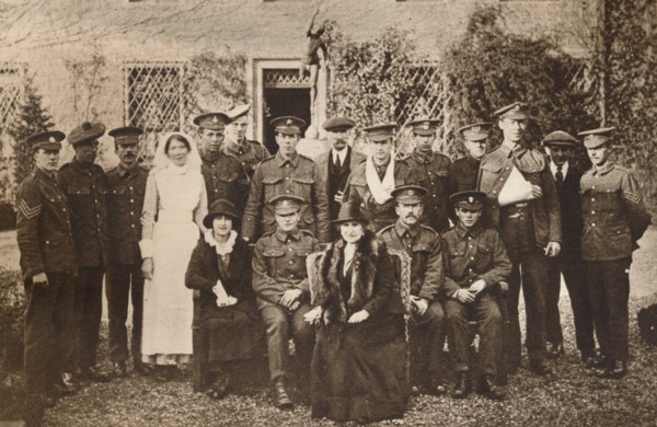 'Lady Elizabeth with Countess of Strathmore and convalescent wounded soldiers', 1916 Creator: Unknown.