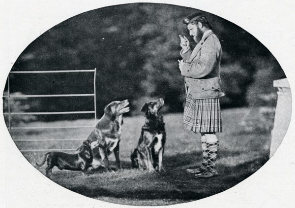 'Mr. Francis Clark, The Queen's Gillie, with three of her favourite dogs', c1899, (1901). Artist: GW Wilson and Company.