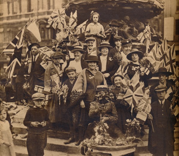Victory celebrations underneath Eros, Piccadilly, London, 1918, (1938). Artist: Unknown.