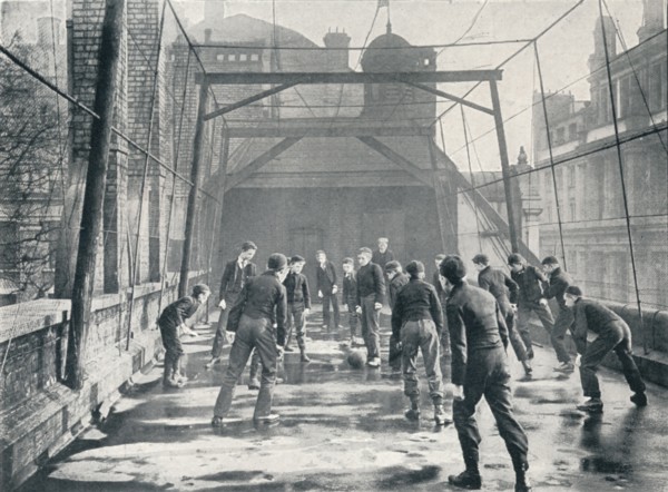 Boys playing football on the roof of St Paul's Cathedral Choir School, London, c1901 (1901). Artist: Unknown.