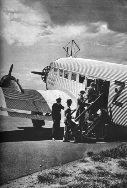 Passengers boarding one of the Junkers airliners of South African Airways, c1936 (c1937). Artist: Unknown.