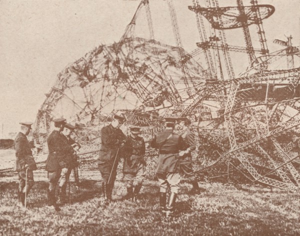British staff officers examining the wreckage of a Zeppelin brought down in England, c1917 (1919). Artist: Unknown.