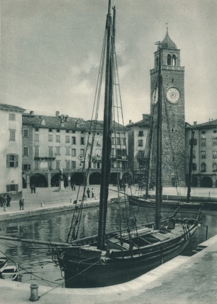 Harbour and Torre Apponale, Riva del Garda, Italy, 1927. Artist: Eugen Poppel.