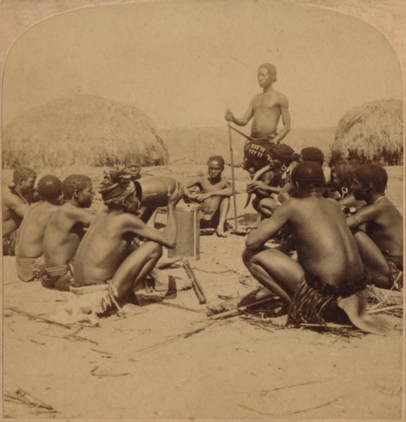 'Braves of a Zulu Village holding a Council, near the Umlaloose River, Zululand, S.A.', 1901. Artist: Unknown.