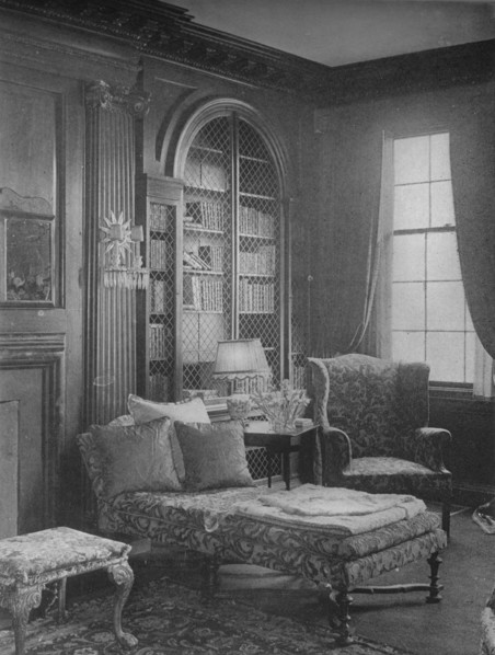Comfortable corner in the library showing bookcase, house of Miss Anne Morgan, New York City, 1924. Artist: Unknown.
