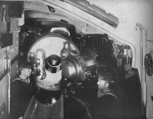 'Inside the Barbette of a Battleship showing the opened breech of a 13'5 inch gun', 1914. Artist: Unknown.