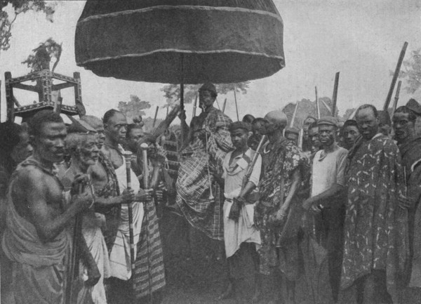 'The Subdued King of Akim Carried on his Chair of State', 1902. Artist: Unknown.
