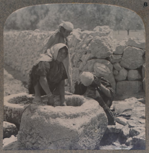 'Women drawing water at the Fountain of the Magi, on the road to Bethlehem', c1900. Artist: Unknown.