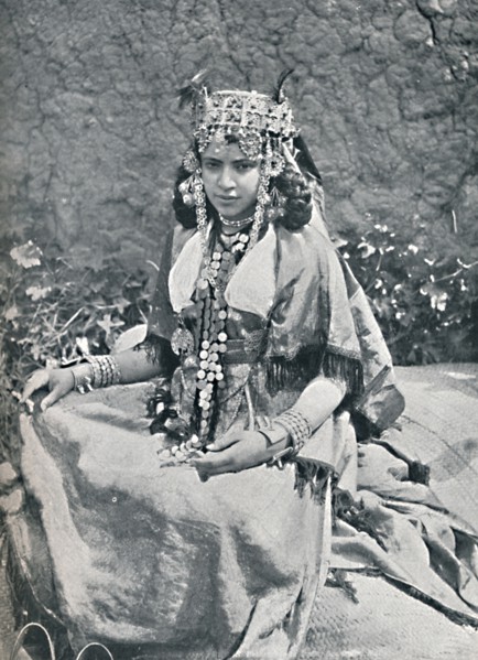 An Algerian woman in gala costume, 1912. Artist: Neurdein freres.