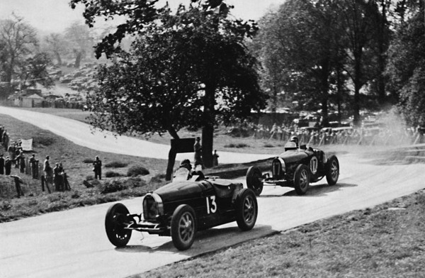 'Thrilling racing in rural England: Bugattis at Donington', 1937. Artist: Unknown.