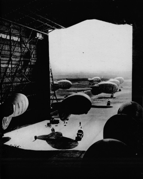 Putting barrage ballons into a hangar, 1943. Artist: Unknown.