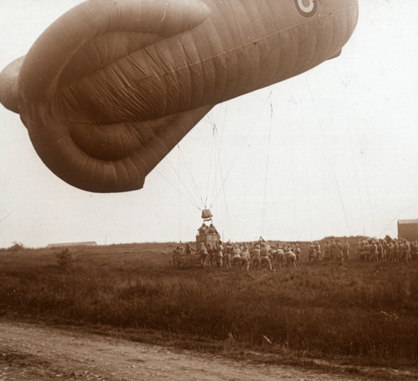 Raising of barrage balloon with basket for observation, c1914-c1918. Artist: Unknown.