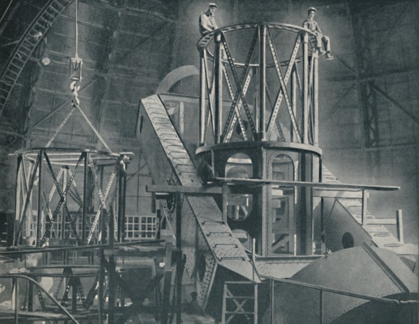 'Section By Section Mounts The Huge Steel Framework of the Hooker's Cylinder', c1935. Artist: Unknown.