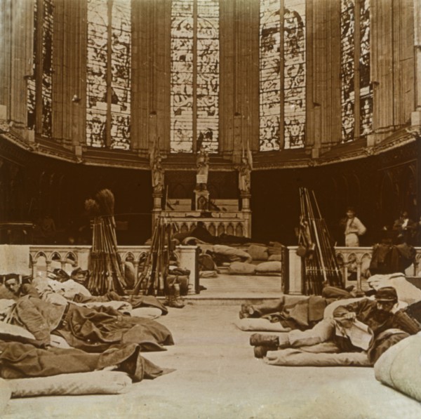 Makeshift barracks in a church, Marne, northern France, 1914.  Artist: Unknown.