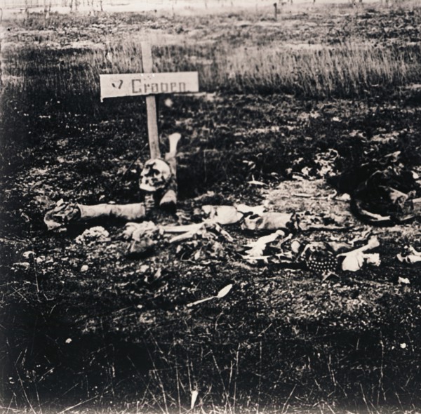 Cross and human remains, c1914-c1918. Artist: Unknown.