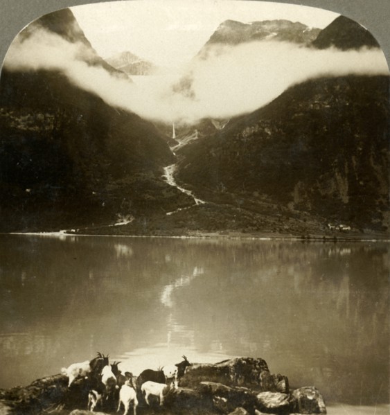 'Grytereids glacier glittering above drifting clouds,  across placid Lake Olden, Norway', c1905. Creator: Unknown.