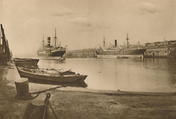 'Carriers of London's Food: Unloaded Cargo Boats in the South Dock of the West India Docks', c1935. Creator: Langfier.