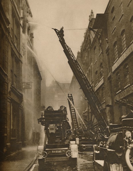 'How The London Fire Brigade Comes To Grips With Its Enemy', c1935. Creator: Unknown.