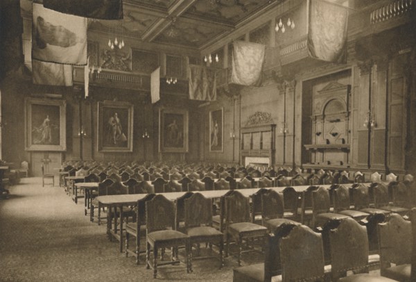'Flag-Hung Great Hall in Which the Powerful Company of Grocers Holds Its Banquets', c1935. Creator: Unknown.
