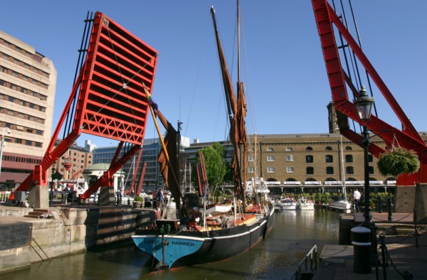 Barge passing through St Katherine's Lock, London