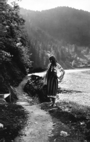Young woman on a mountain footpath, Bistrita Valley, Moldavia, north-east Romania, c1920-c1945. Artist: Adolph Chevalier