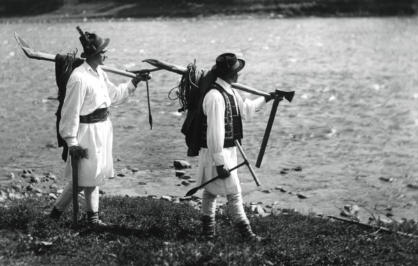 Foresters carrying their tools, Bistrita Valley, Moldavia, north-east Romania, c1920-c1945. Artist: Adolph Chevalier