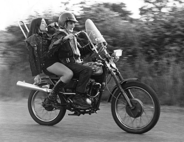Teenagers on a motobike, Charlwood, Surrey, 1972.