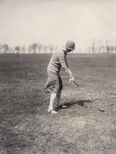 A lady golfer playing at Falsterbo Colf Club, Sweden. Artist: Otto Ohm