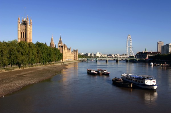 River Thames, Houses of Parliament and The London Eye, London.