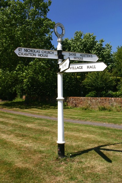 Signpost pointing to Jane Austen's House, Chawton, Hampshire.