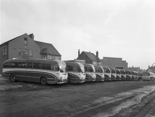 Fleet of Phillipson's coaches, Goldthorpe, South Yorkshire, 1963.  Artist: Michael Walters