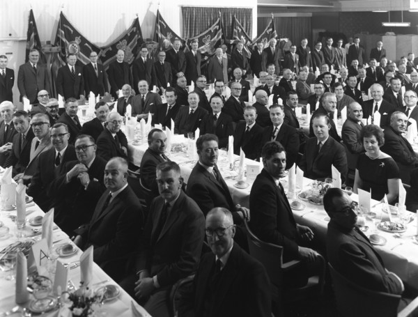 Members of the Royal Army Ordnance Corps (RAOC) gather for their annual dinner, 1965. Artist: Michael Walters